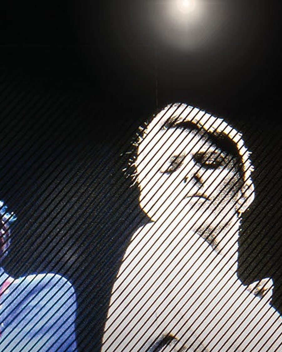 David Bowie in a black-and-white portrait from the You're Not Alone poster, Lightroom King's Cross - the official exhibition image