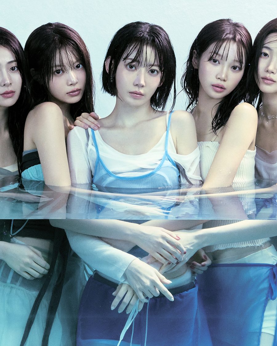 LE SSERAFIM, the five members in pale blue outfits leaning together against a soft blue backdrop - the official tour image